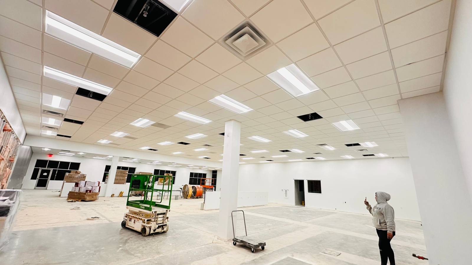 Acoustical ceiling grid in a finished room