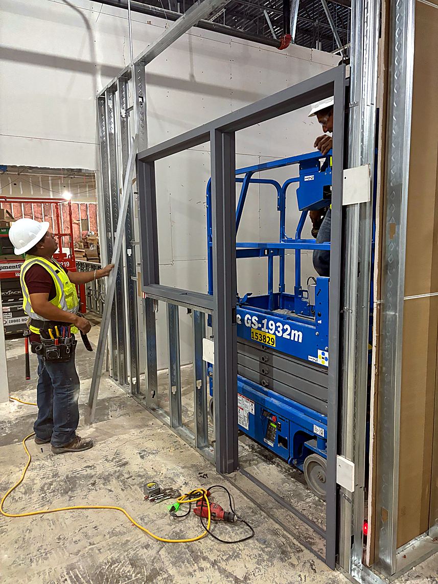 Framing a lab wall with a lift