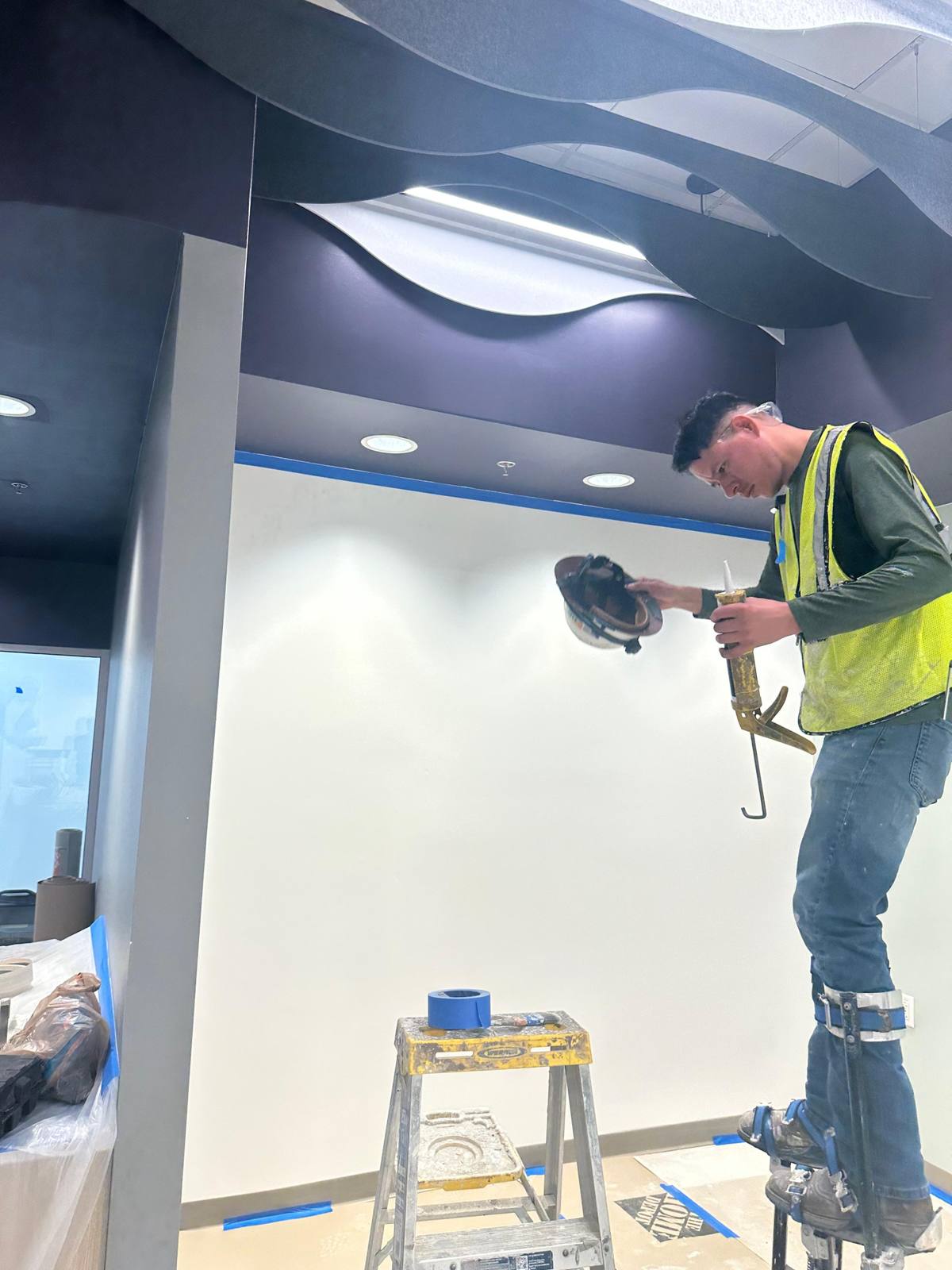 Finisher sanding drywall